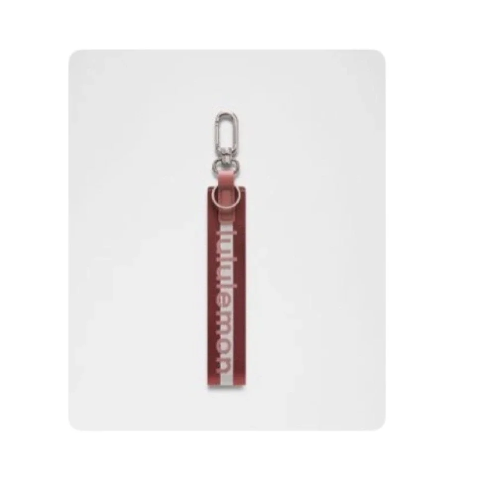 Lululemon Never Lost Keychain Reflective Rockwood/Red Clay NWT